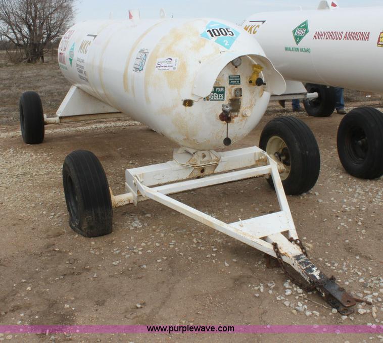 image for item A7371 1000 gallon anhydrous ammonia tank with running gear