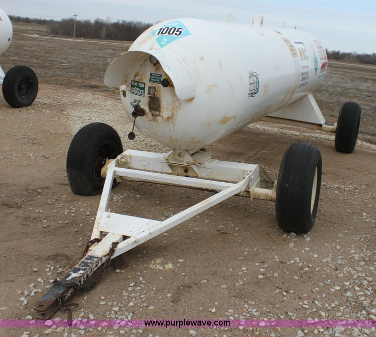 image for item A7371 1000 gallon anhydrous ammonia tank with running gear