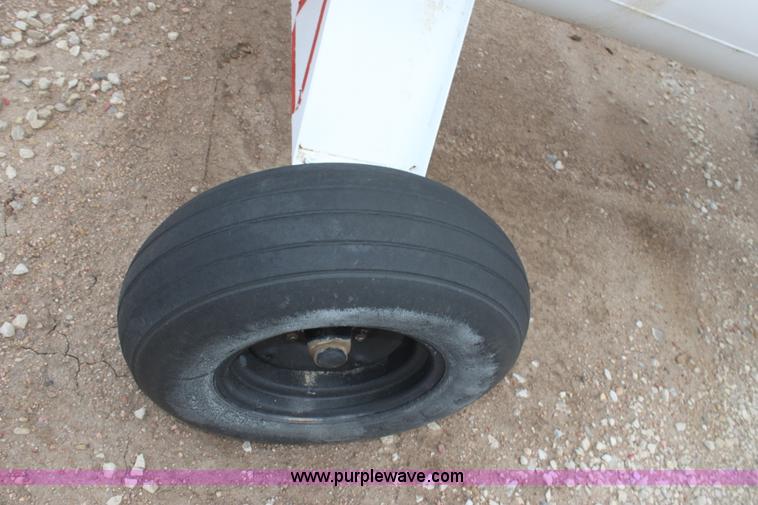 image for item A7371 1000 gallon anhydrous ammonia tank with running gear