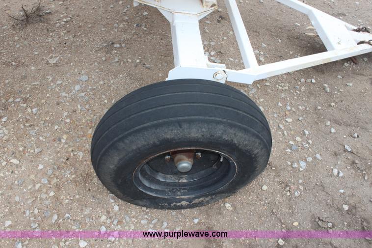 image for item A7371 1000 gallon anhydrous ammonia tank with running gear