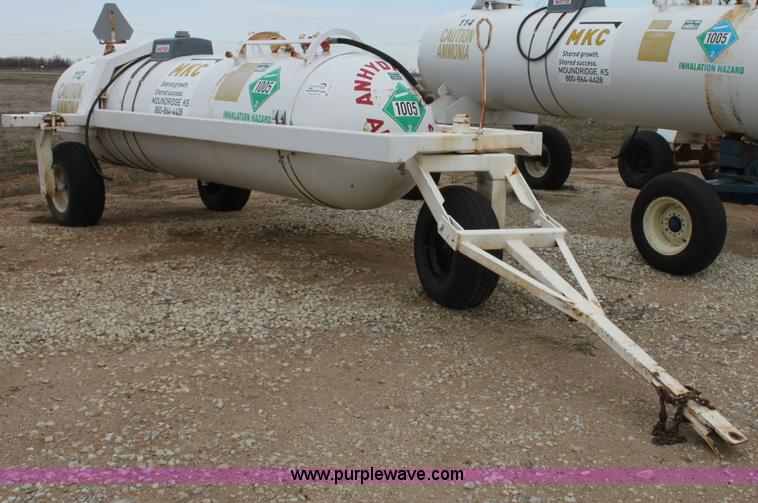image for item A7372 1000 gallon anhydrous ammonia tank with running gear