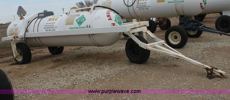 image for item A7372 1000 gallon anhydrous ammonia tank with running gear