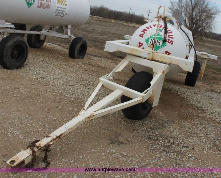 image for item A7372 1000 gallon anhydrous ammonia tank with running gear
