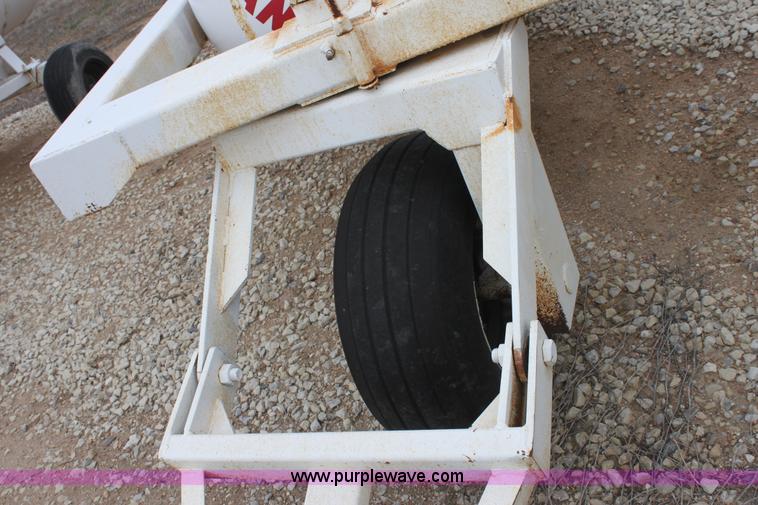 image for item A7372 1000 gallon anhydrous ammonia tank with running gear