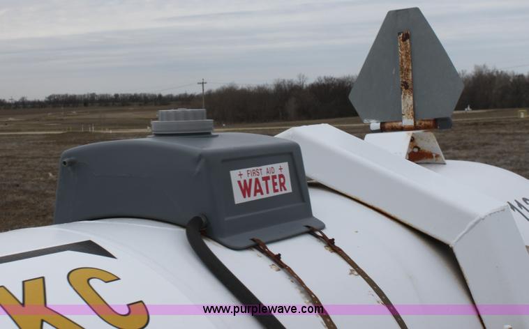 image for item A7372 1000 gallon anhydrous ammonia tank with running gear
