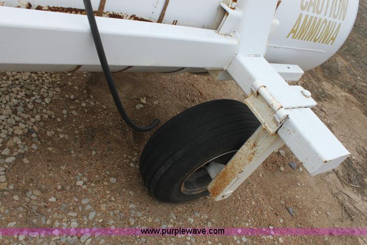 image for item A7372 1000 gallon anhydrous ammonia tank with running gear