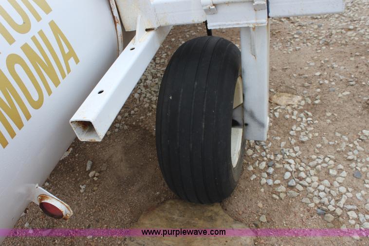 image for item A7372 1000 gallon anhydrous ammonia tank with running gear