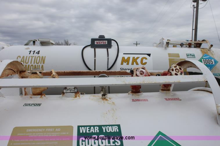 image for item A7372 1000 gallon anhydrous ammonia tank with running gear