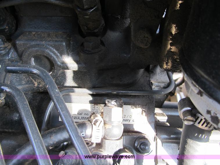 image for item B2630 2004 New Holland TC33DA MFWD tractor