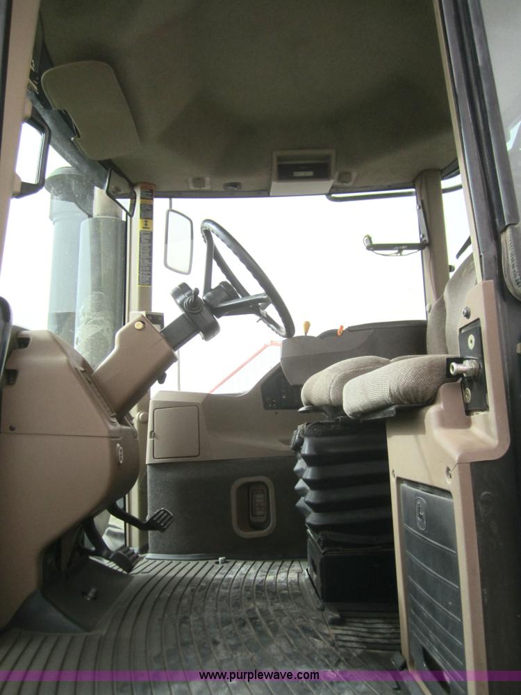 image for item B5692 2003 John Deere 9520 4WD tractor