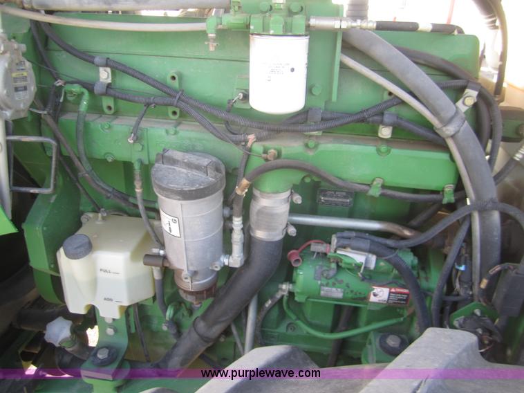 image for item B5693 2004 John Deere 9520 4WD tractor