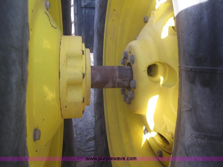 image for item B5693 2004 John Deere 9520 4WD tractor