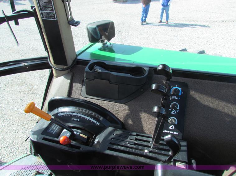 image for item B7142 1992 John Deere 4560 MFWD tractor