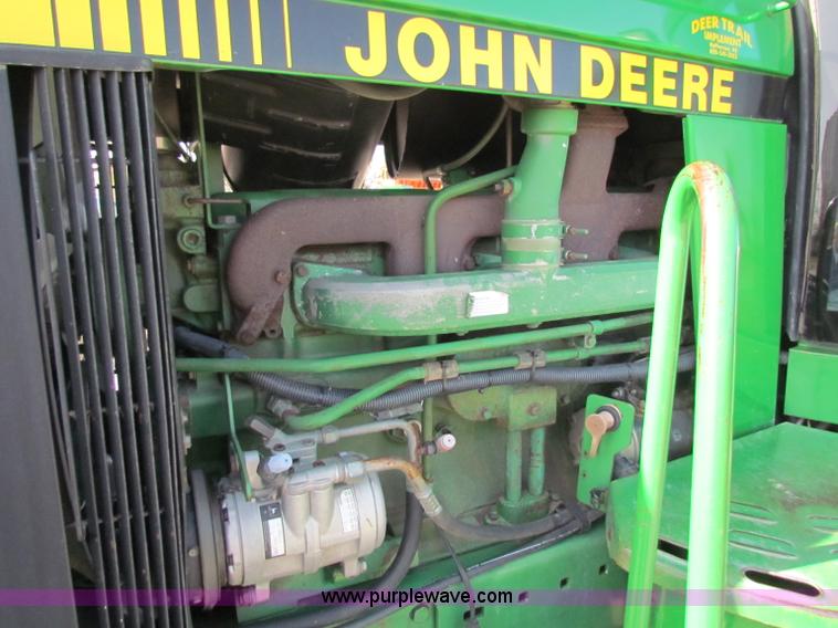 image for item B7142 1992 John Deere 4560 MFWD tractor