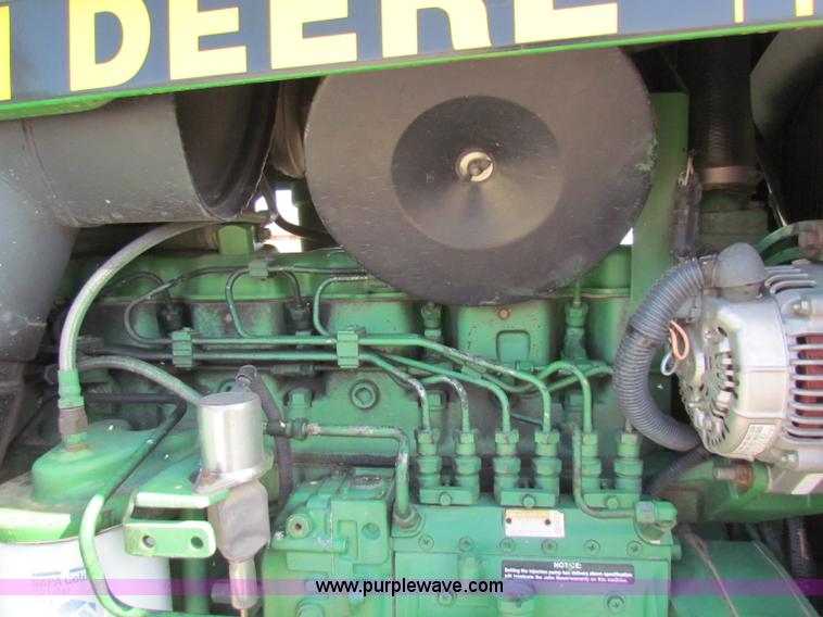 image for item B7142 1992 John Deere 4560 MFWD tractor
