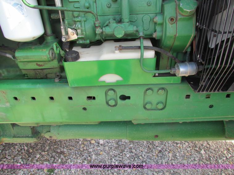 image for item B7142 1992 John Deere 4560 MFWD tractor