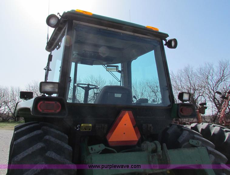 image for item B7142 1992 John Deere 4560 MFWD tractor