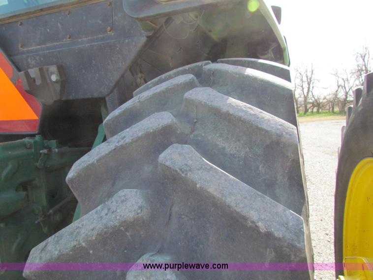 image for item B7142 1992 John Deere 4560 MFWD tractor