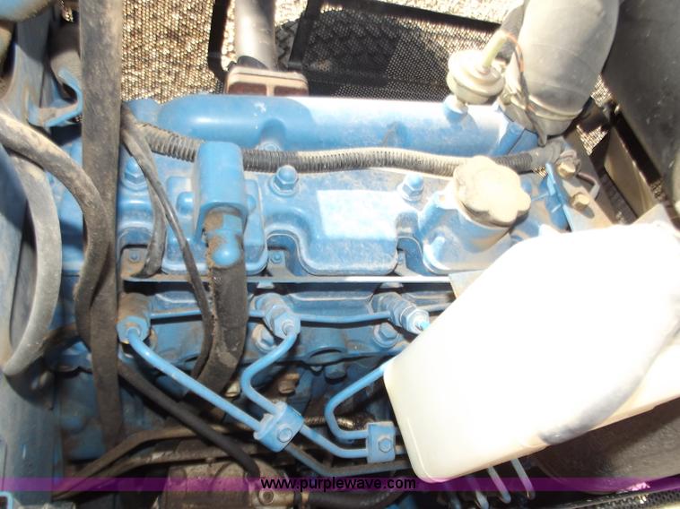 image for item D3617 2001 New Holland 2120 FWA tractor