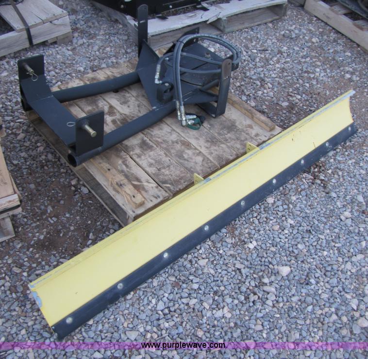 image for item C9641 John Deere 60" mid-mount lawn mower snow blade