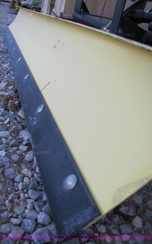 image for item C9641 John Deere 60" mid-mount lawn mower snow blade