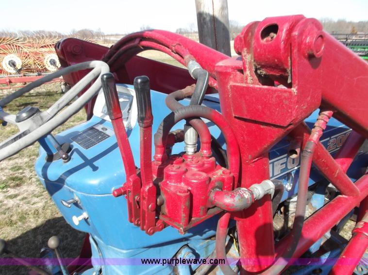 image for item D3580 1968 Ford 2000 tractor with loader and rotary mower