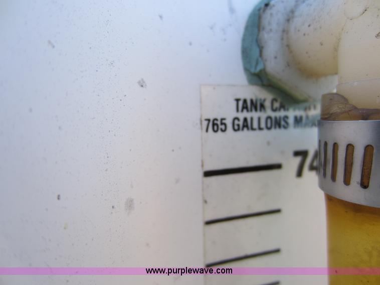 image for item C5355 Dual compartment fiberglass tank on truck bed