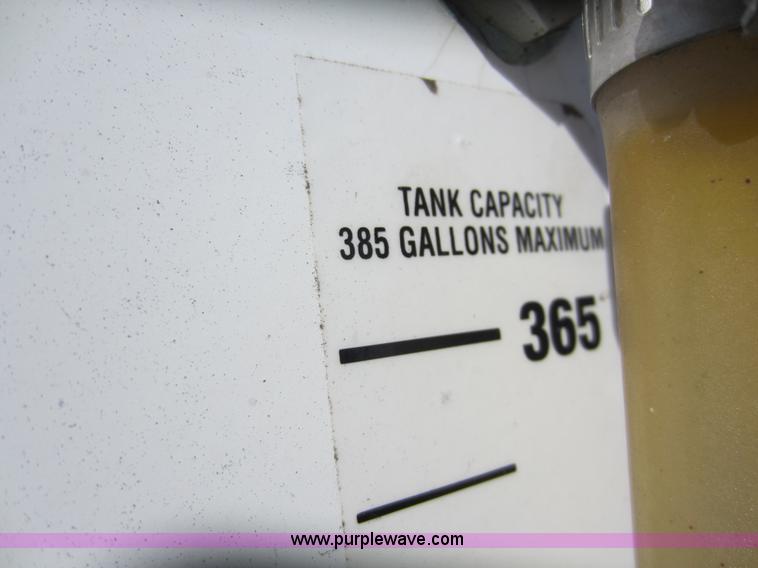 image for item C5355 Dual compartment fiberglass tank on truck bed