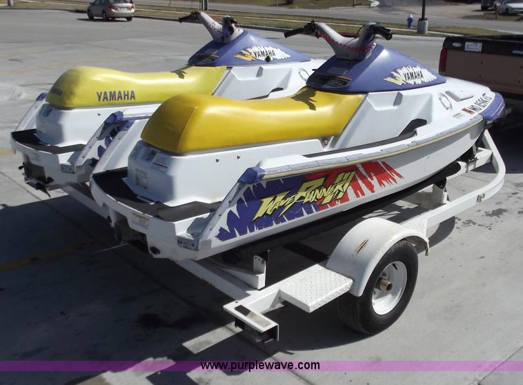 image for item D3682 (2) Yamaha jet skis with trailer