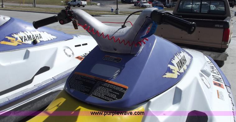 image for item D3682 (2) Yamaha jet skis with trailer
