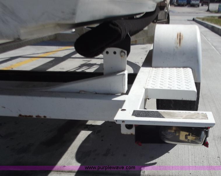 image for item D3682 (2) Yamaha jet skis with trailer