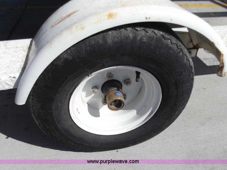 image for item D3682 (2) Yamaha jet skis with trailer