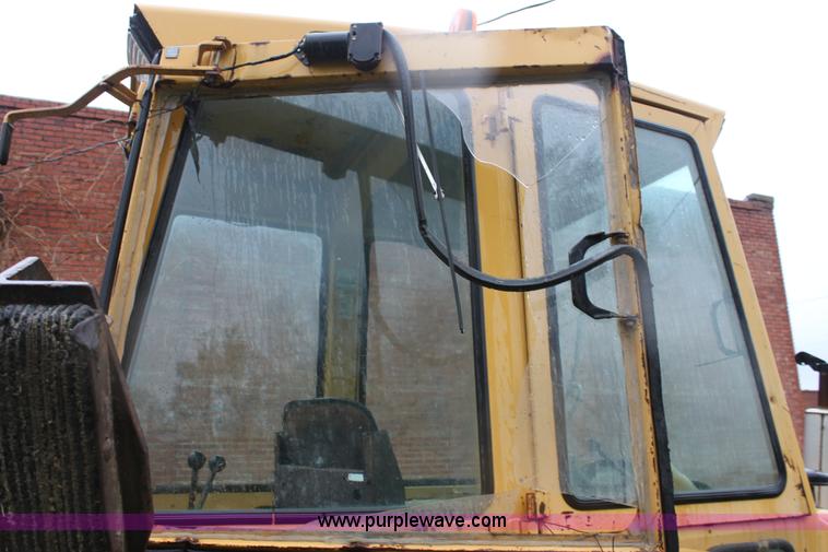 image for item D7543 Ford 555B backhoe