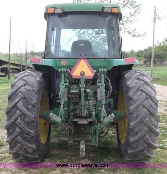 image for item B1103 1995 John Deere 7200 MFWD tractor with loader