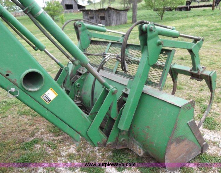 image for item B1103 1995 John Deere 7200 MFWD tractor with loader