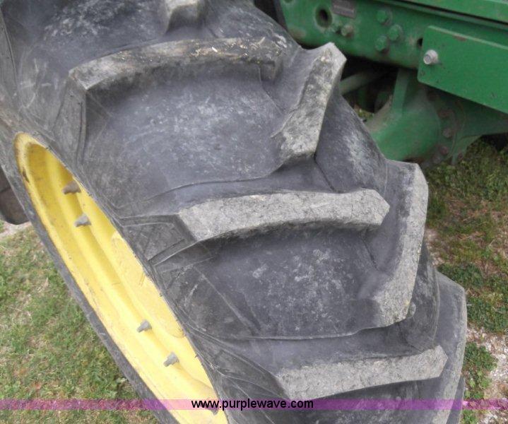 image for item B1103 1995 John Deere 7200 MFWD tractor with loader
