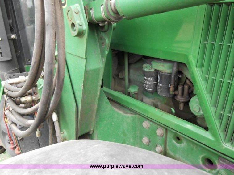image for item B1103 1995 John Deere 7200 MFWD tractor with loader
