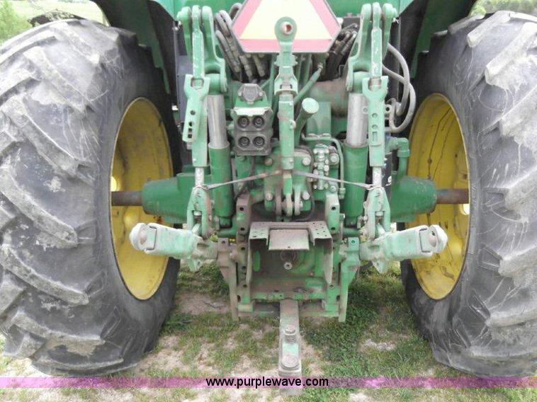 image for item B1103 1995 John Deere 7200 MFWD tractor with loader