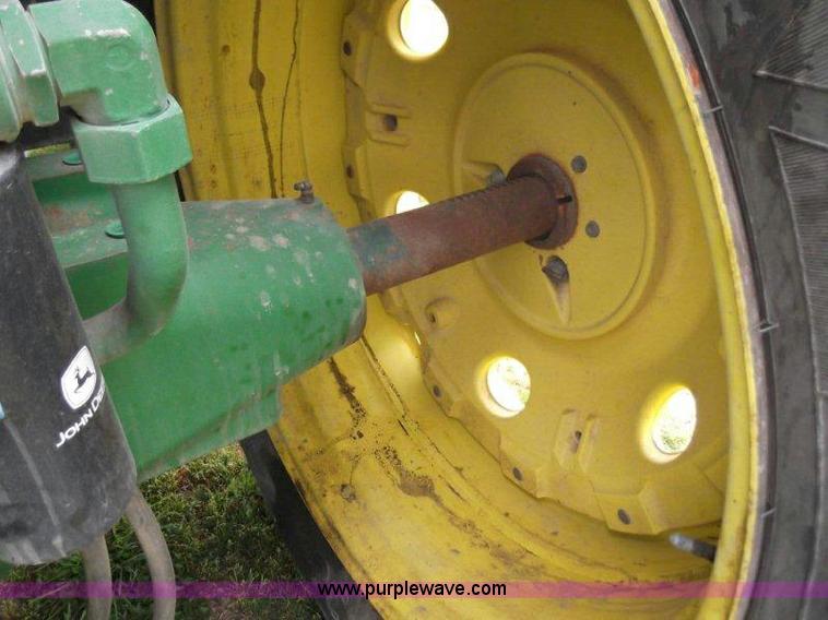 image for item B1103 1995 John Deere 7200 MFWD tractor with loader