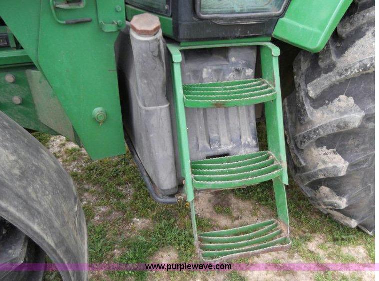 image for item B1103 1995 John Deere 7200 MFWD tractor with loader