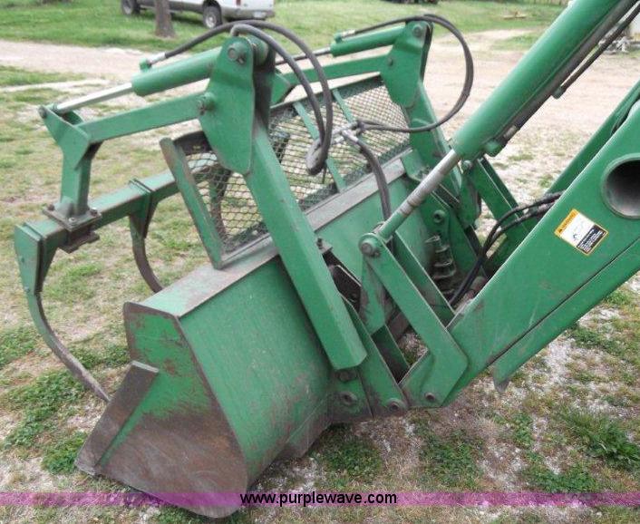 image for item B1103 1995 John Deere 7200 MFWD tractor with loader