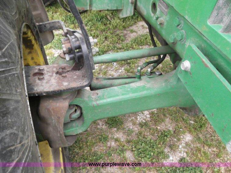 image for item B1103 1995 John Deere 7200 MFWD tractor with loader
