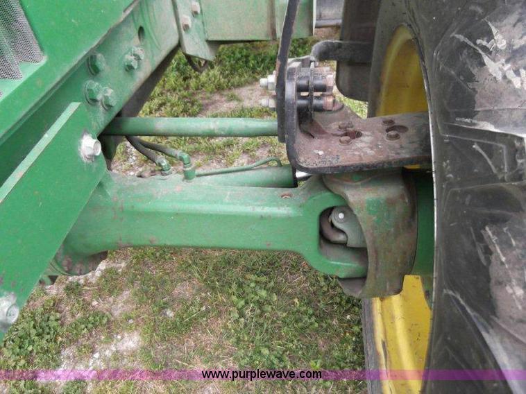 image for item B1103 1995 John Deere 7200 MFWD tractor with loader
