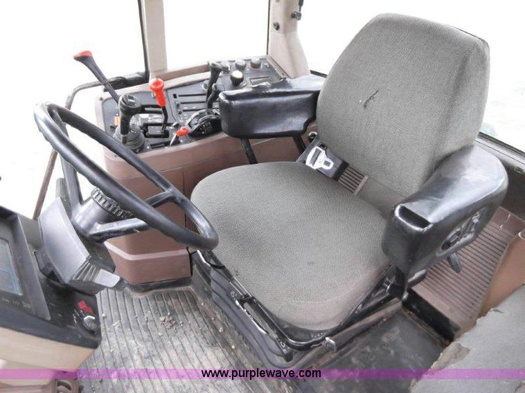 image for item B1103 1995 John Deere 7200 MFWD tractor with loader