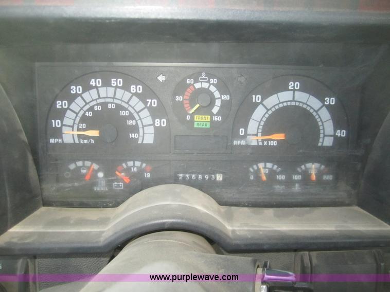 image for item F9176 1990 GMC TopKick truck with end gate lift