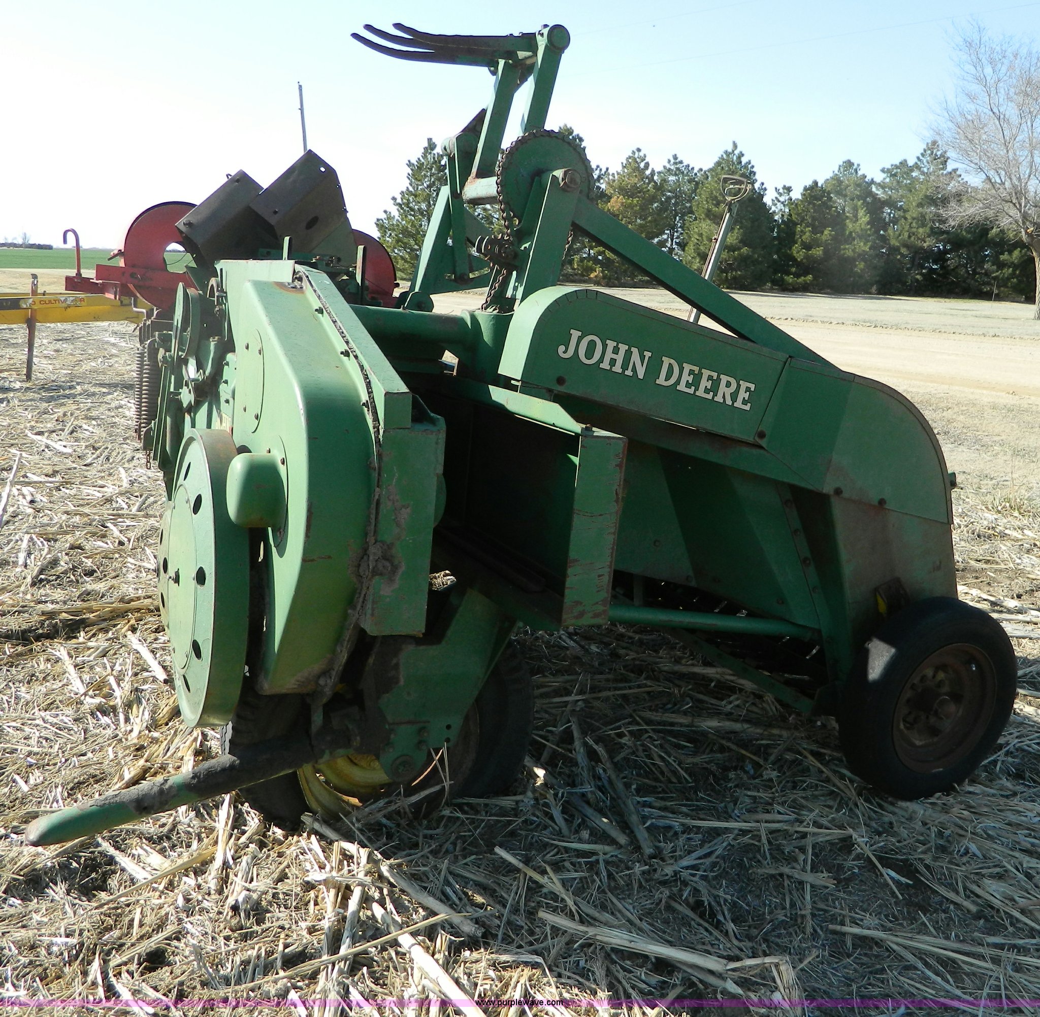 John Deere square baler in Beloit, KS Item B3558 sold Purple Wave