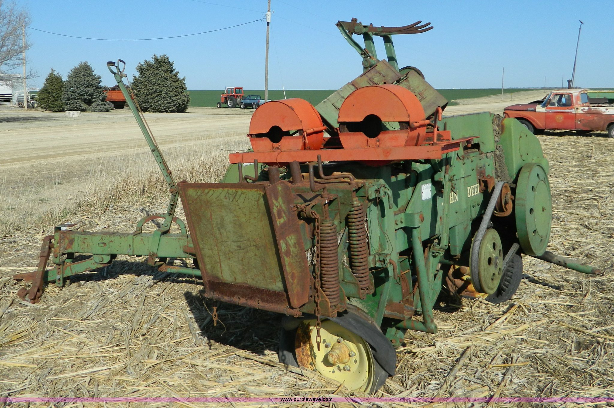 John Deere square baler in Beloit, KS Item B3558 sold Purple Wave