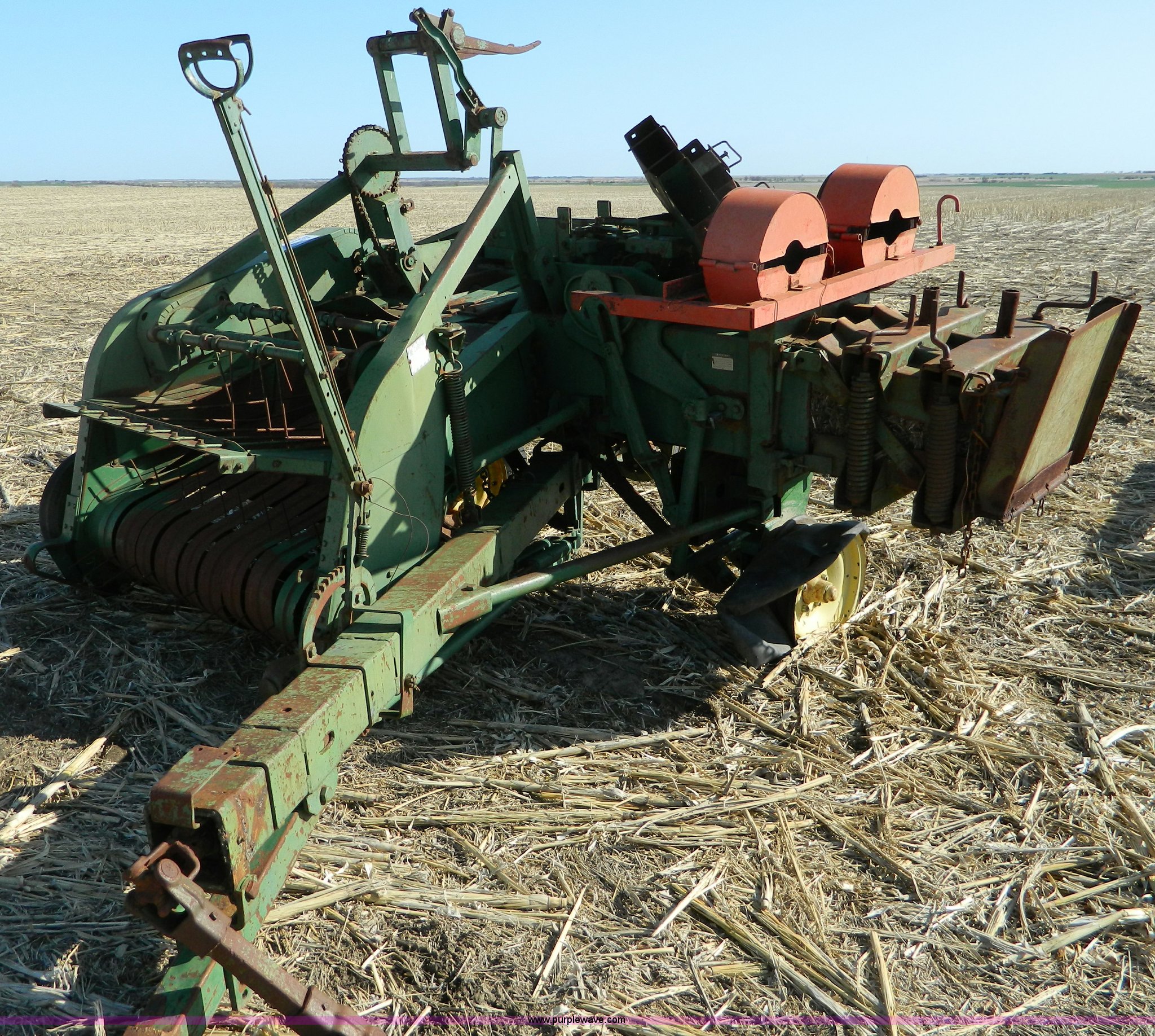 John Deere square baler in Beloit, KS Item B3558 sold Purple Wave