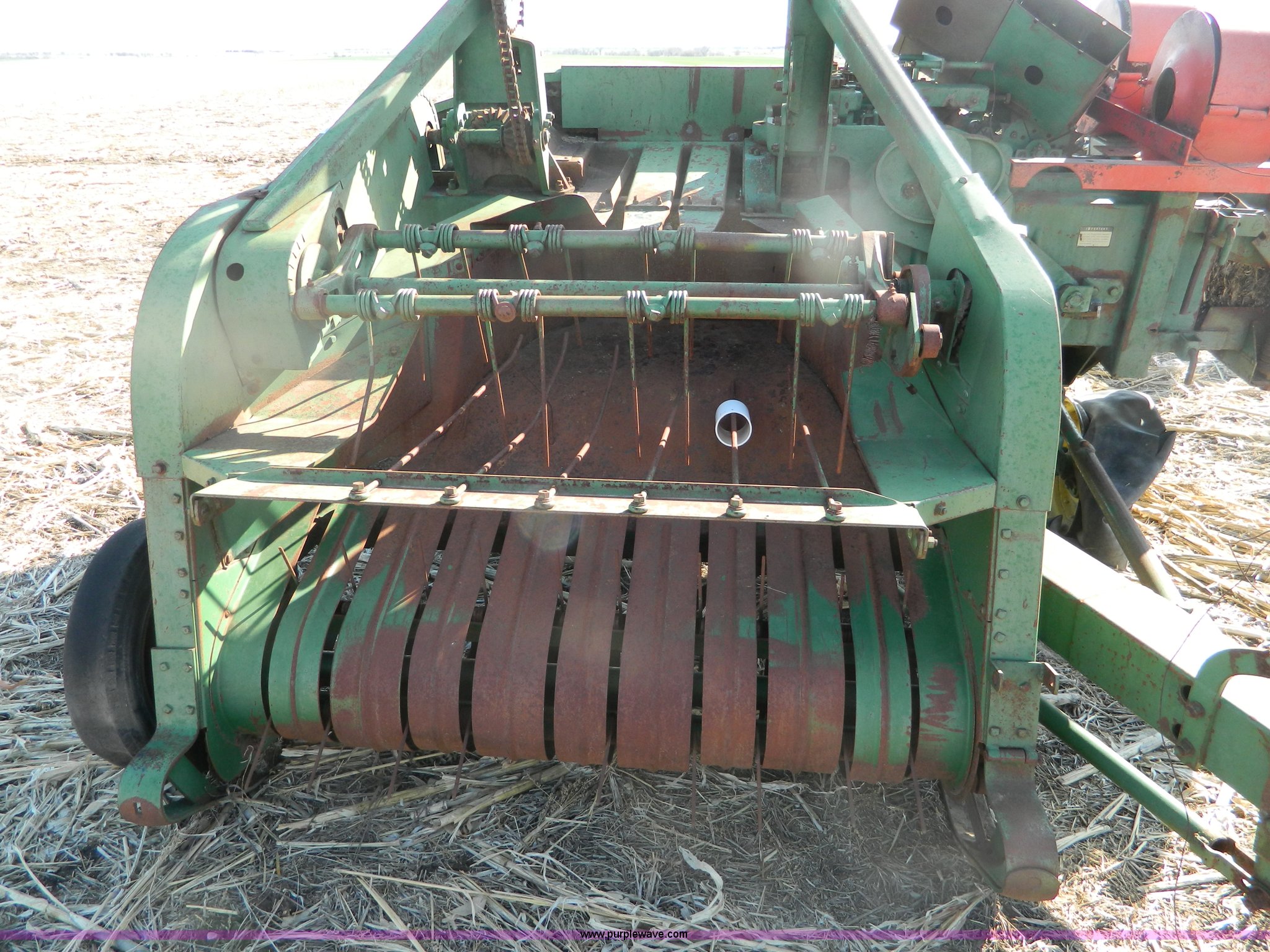 John Deere square baler in Beloit, KS Item B3558 sold Purple Wave
