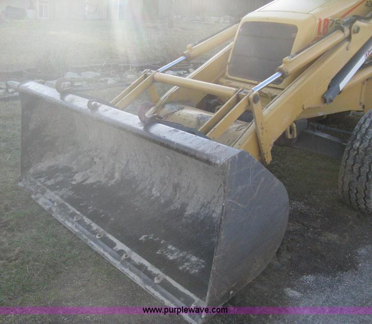 image for item A4383 1999 New Holland LB75 backhoe